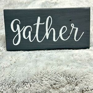 Hand painted “Gather” wooden wall sign.